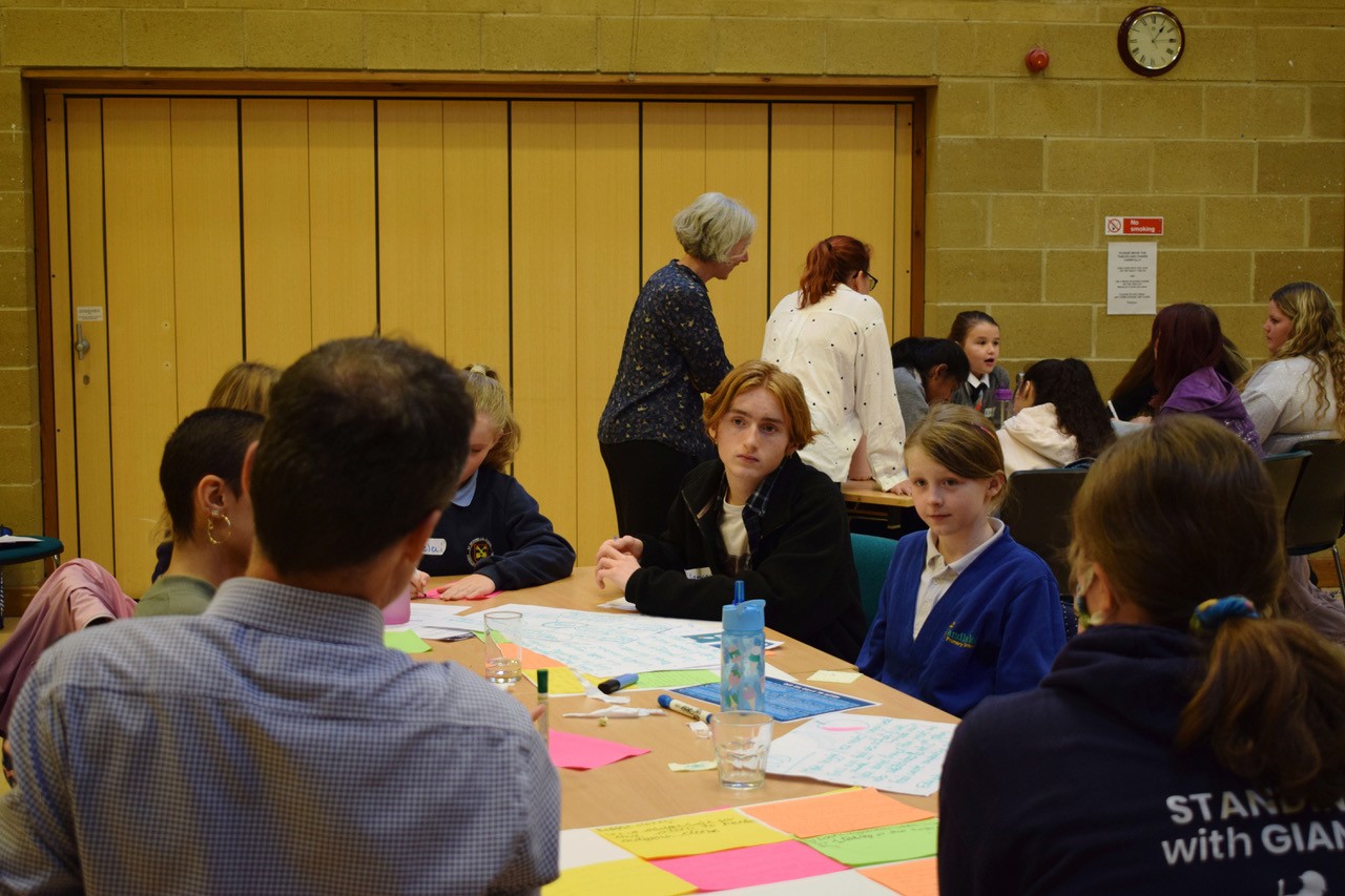 James Cadman and students chatting