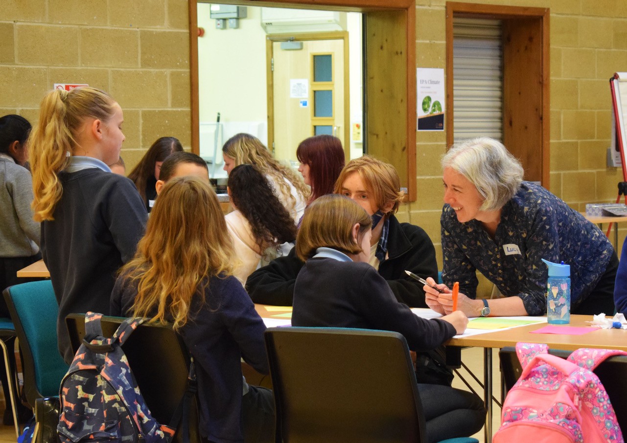 Lucy chatting with students